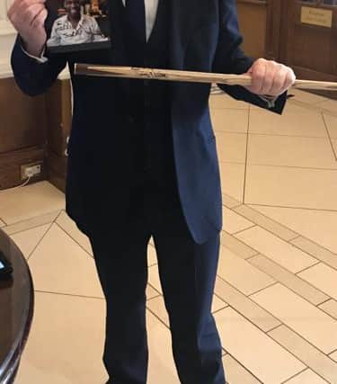 Jimmy White signed a snooker cue and photo for Mick's family.