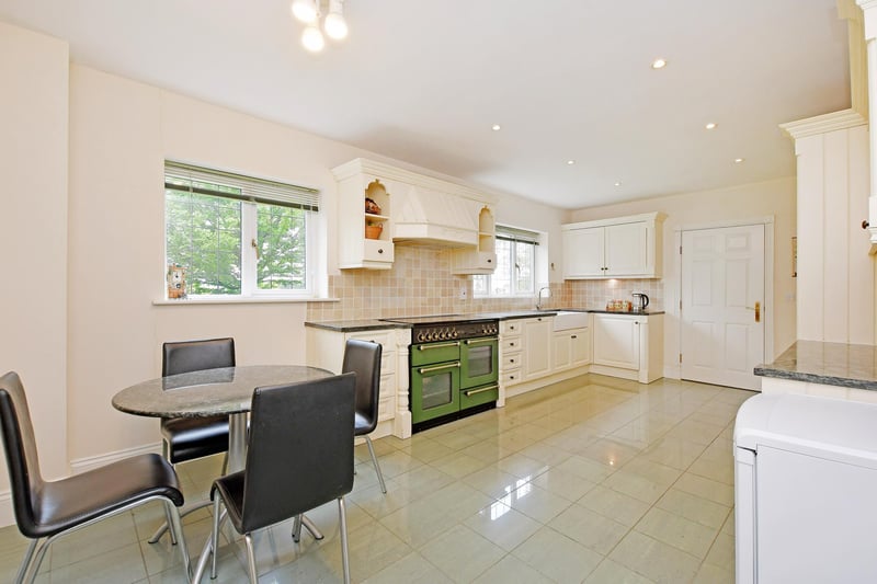 A good-sized breakfast kitchen with double glazed leaded windows and tiled flooring with under floor heating. There’s a range of fitted base/wall and drawer units incorporating matching granite work surfaces, tiled splash backs, under counter lighting and an inset 2.0 bowl sink with a mixer tap.