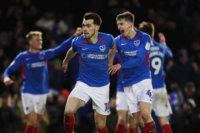 John Marquis celebrates his last-gasp winner against Exeter