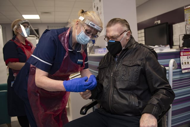 Patient Anthony Moore at the Northern General Hospital, Sheffield, receiving his first COVID Pfizer vaccine doses (Pooled picture by Andy Stenning-Daily Mirror)