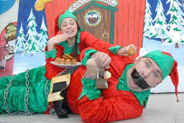 Santa's naughty elves were pictured getting ready for a show in 2012. Here are Rachel Teate and Wayne Miller at the Cave.