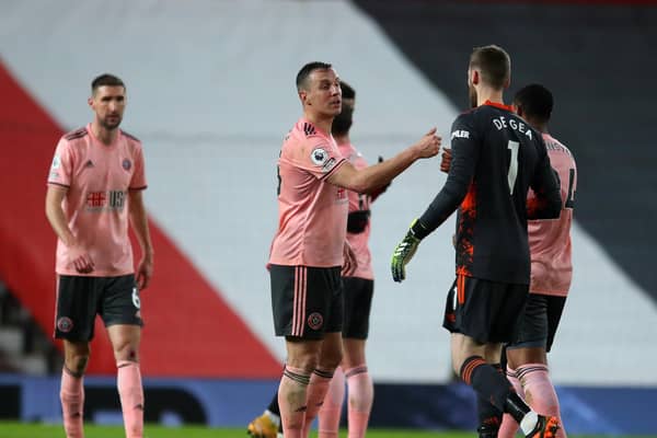 Sheffield United's Phil Jagielka celebrates at the final whistle after his side's 2-1 win at Manchester United on Wednesday night. Photo: Simon Bellis/Sportimage.