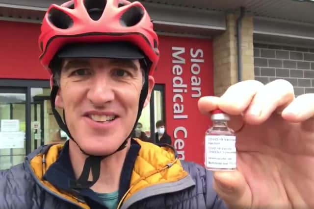 Sheffield GP Dr Ollie Hart holding a vial of the Oxford-AstraZeneca Covid vaccine