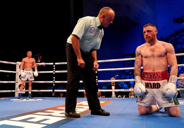 Ray Moylette (right) after being knocked down by Dalton Smith during their WBC International Silver Super-Lightweight Title fight at the First Direct Arena, Leeds: Martin Rickett/PA Wire.