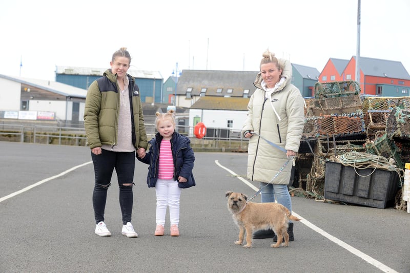 Laura Jobson-Caldow with Edie Knowles, age four, and Rebecca Jobson-Caldow with Poppy the dog.
