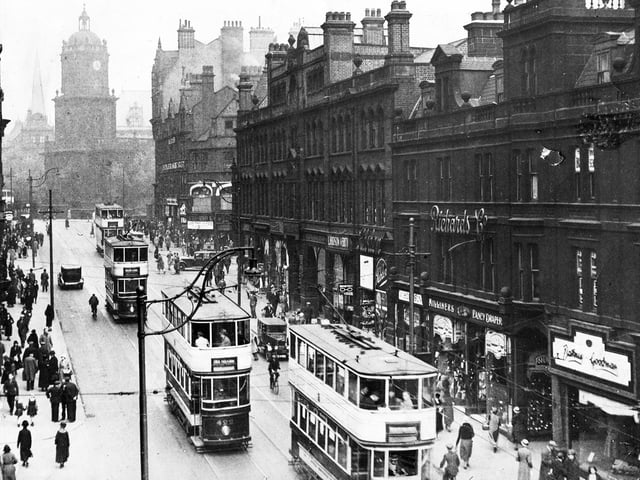 Trams make their way along Pinstone Street in the 1930s