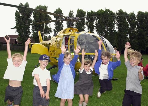Richmond Hill pupils enjoying a visit from the Yorkshire Aim Ambulance. 2001.