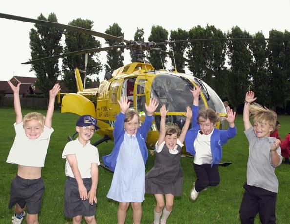 Richmond Hill pupils enjoying a visit from the Yorkshire Aim Ambulance. 2001.