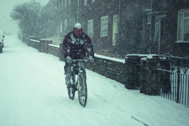This cyclist found himself riding through a Hylton Road snowstorm in 1994.