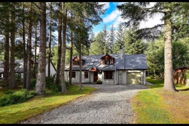 This fantastic home is nestled into its forest surroundings on a 1/3rd of an acre plot and offers an impressively large driveway and garden with mature trees adding to the sense of seclusion. The open fireplace in the lounge adds to its cosy interior while some of the bedrooms offer views of the Cairngorms. 

405,000 GBP