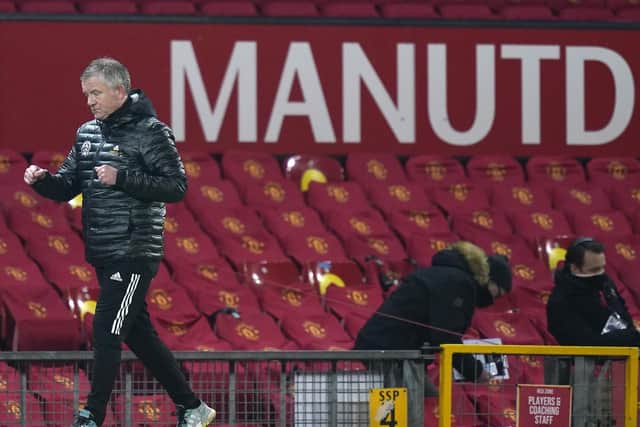Chris Wilder celebrates Sheffield United's win over Manchester United at Old Trafford: Andrew Yates/Sportimage