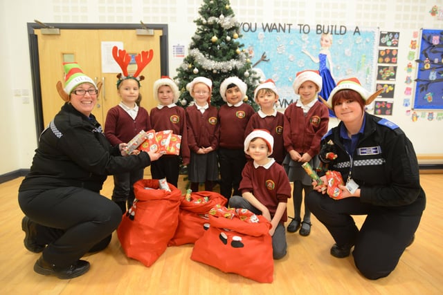 PCSO's Carole Hutton (left) and Kerri Bassom (right) were handing out toys to pupils at Trinity Primary School in Seaham in 2014 after the pupils used Christmas elves in school with an anti-bullying message.