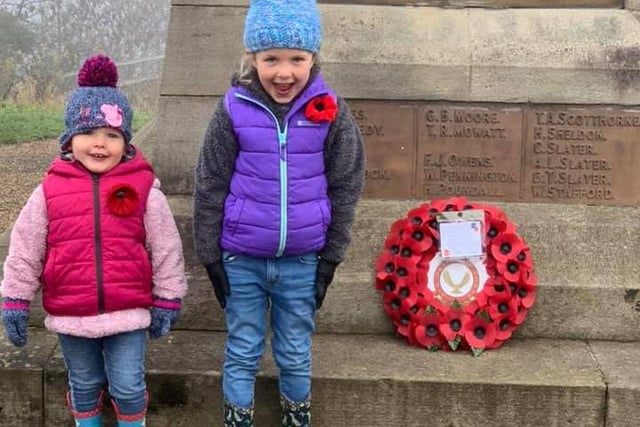 Children laying down a wreath on Remembrance Day, 2020. Shared by mum Sarah Pagliano-Bradley.