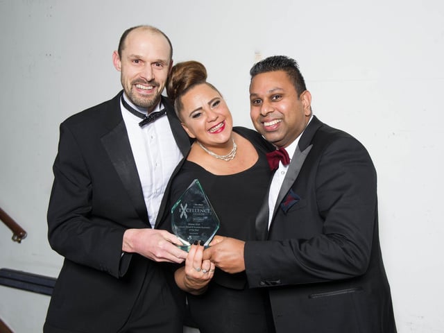 Winners of the Leisure, Retail & Tourism Business of the Year - New Place Hotel, Matthew Bolland, Sarah Lander and Norman Cardoso.