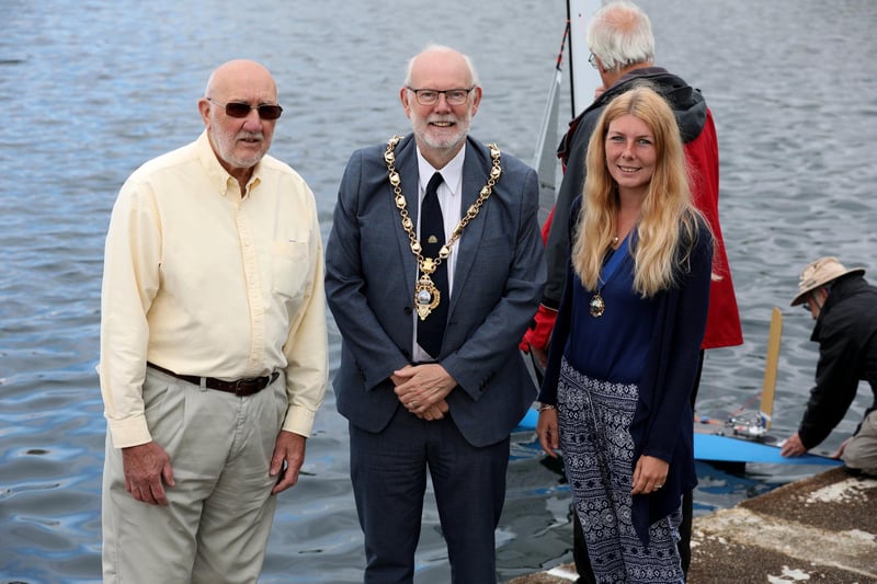 Robert Hobbs, President of the Gosport Model Yacht Club, Mayor Cllr Mark Hook, and Mayor's Consort Natasha Hook.