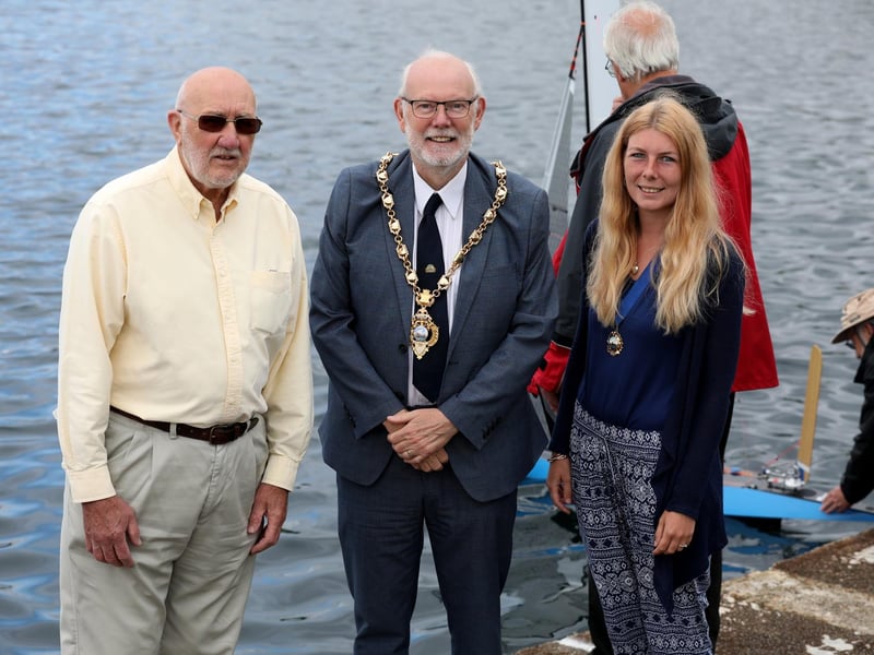 Robert Hobbs, President of the Gosport Model Yacht Club, Mayor Cllr Mark Hook, and Mayor's Consort Natasha Hook.