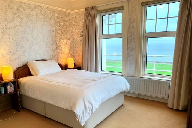 Bright and airy double bedroom with sea views.