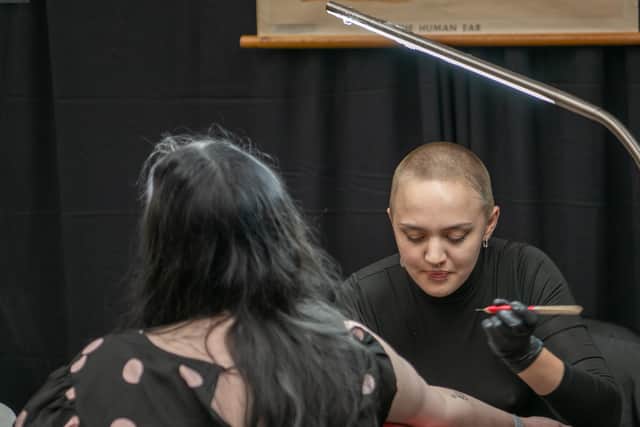 A visitor gets inked at the Sheffield Tattoo Festival. Photo by Scott Antcliffe (www.scottantcliffephoto.co.uk)