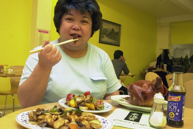 Megachina assistant Lyn Tang samples some of the food available from the French Gate, Doncaster, restaurant and takeaway in 2000