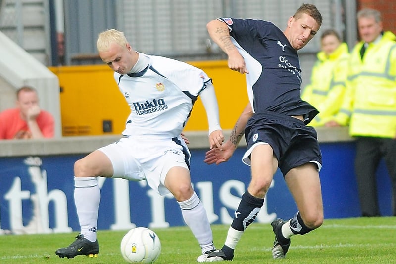 Tussling for the ball with Dundee's Leigh Griffiths in 2009