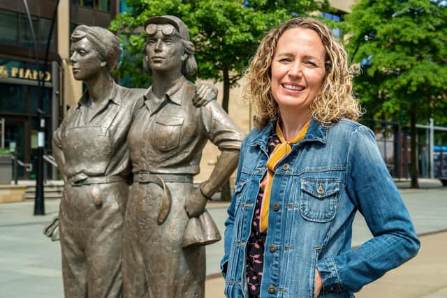 Michelle Rawlins, author of the Women of Steel book, pictured at the Women of Steel statue in Sheffield. Picture Bruce Rollinson