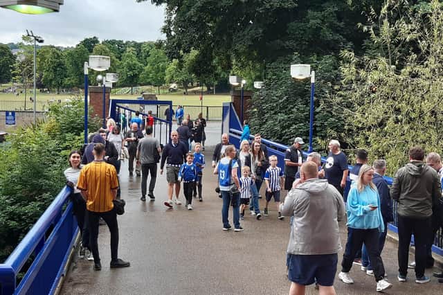 Fans heading in to Hillsborough Stadium through the South Entrance.