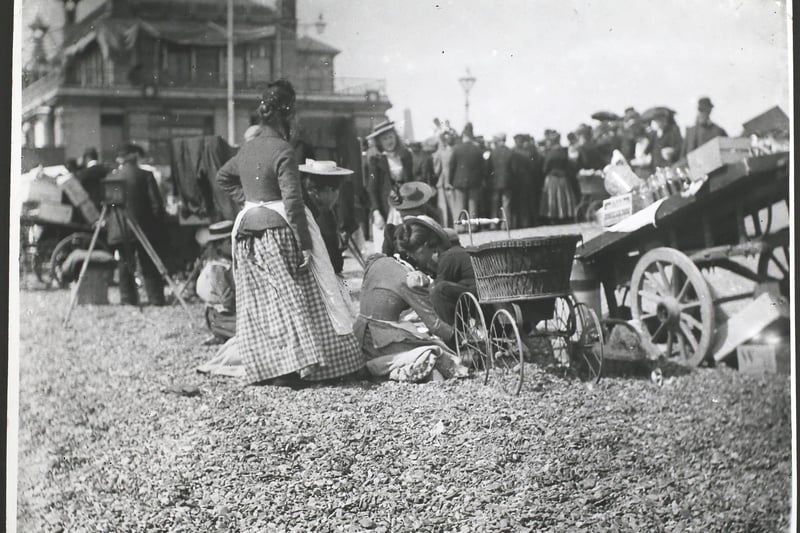 Women with a pram on the beach at Southsea in the 1890s. Photo by F. J. Mortimer/Hulton Archive/Getty Images