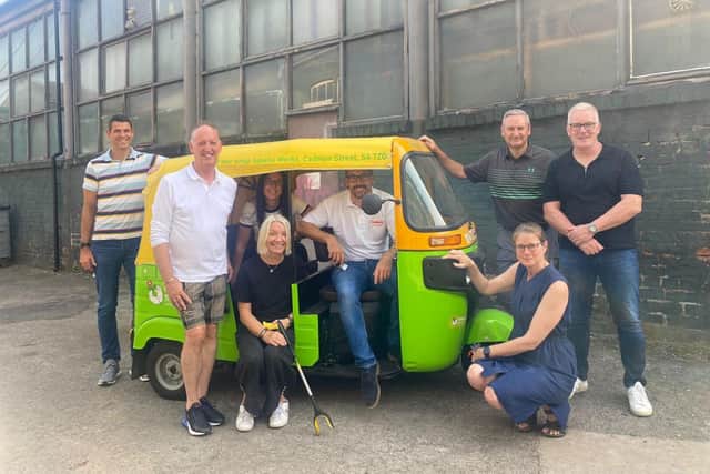 The Cadent team with the distinctive Emmaus Sheffield Tuk Tuk
