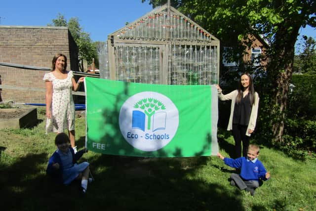 Pictured (L-R) Eco team leader and teaching assistant, Mrs Heathcote, Year 1 teacher Miss Rawding, and Royd Nursery Infant pupils