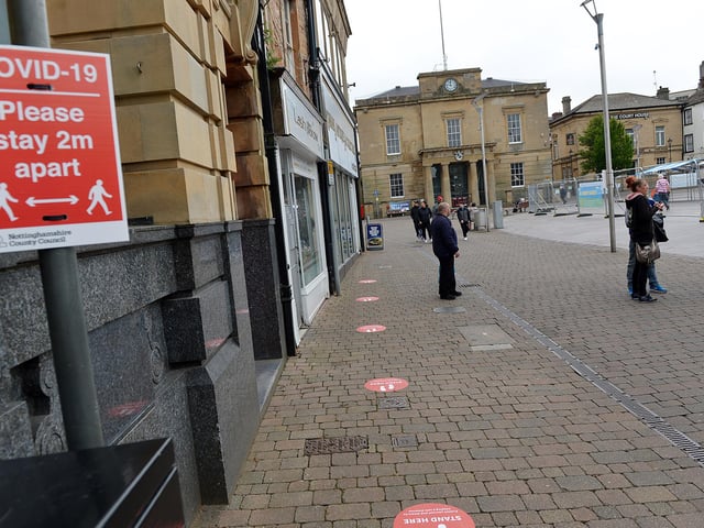 Mansfield Town centre 10 weeks into lockdown. Signs going up in preparation for more lockdown easing on Monday June 15th.