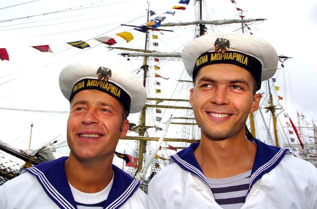 Sailors from the ship Jadran - that has not been in Portsmouth since 1939 - (left to right) Slobodan Dakonovic (21) and Uglesa Vekovic (21) 3rd July 2005. Malcolm Wells 053125-263