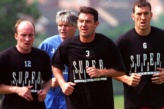 Boss John Duncan with players Iain Dunn, Lee Rogers and Darren Carr during pre-season.