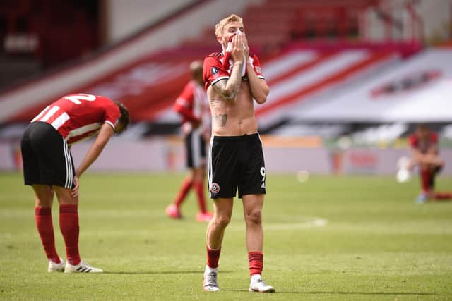 SHEFFIELD, ENGLAND - JUNE 28: Oliver McBurnie of Sheffield United reacts at the full time whistle during the FA Cup Fifth Quarter Final match between Sheffield United and Arsenal FC at Bramall Lane on June 28, 2020 in Sheffield, England. (Photo by Oli Scarff/Pool via Getty Images)