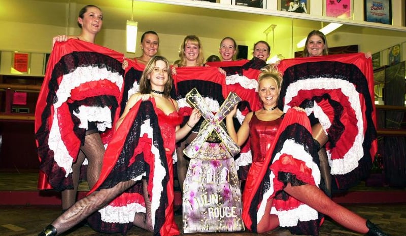 Jackie Everton Dancers in 2001. Dancers dressed up for a Moulin Rouge inspired performance.