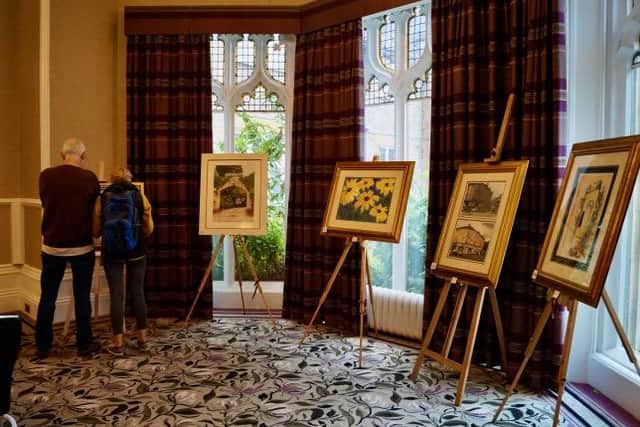 The frames and art attracted a lot of interest and raised more than £1,500 for charity
