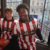 Oliver Arblaster (centre) and Andre Brooks (right) at Sheffield United's promotion parade with goalkeeper Marcus Dewhurst: Paul Thomas /Sportimage