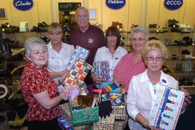 Pictured  in the shoe department at  Atkinsons on the Moor, Sheffield, where an Operation Christmas Child shoe box appeal took place. Staff at the department handed over a chque for £40.00 which was money the collected from customers giving to the  appeal box. Seen LtoR are Staff Jean Kirk, Sue Brooke,  Tony Loach from the appeal, staff Ann Cranmer, Val Loach from the appeal, and staff  Pam Thomas. Picture taken in October 2007