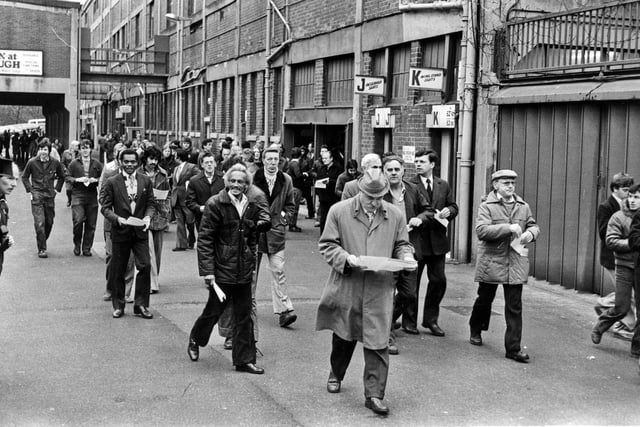 Workers leaving a redundancy meeting at Hadfields steel works, Hillsborough, Sheffield, in April 1981