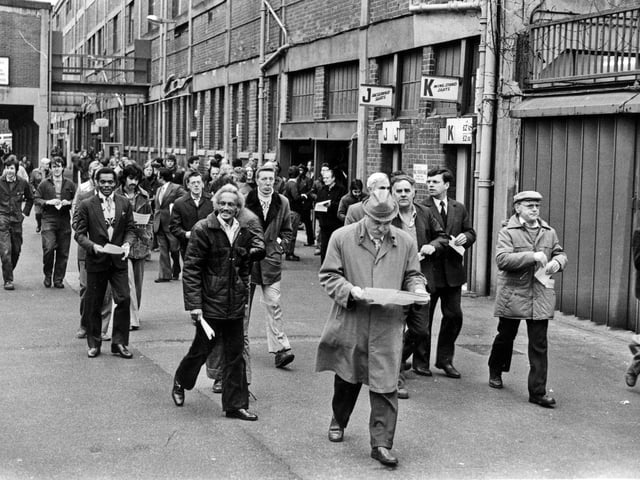 Workers leaving a redundancy meeting at Hadfields steel works, Hillsborough, Sheffield, in April 1981