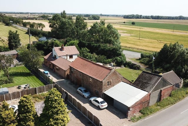 This eight bedroom house in Thorne also includes an old farmhouse and costs £935,000.