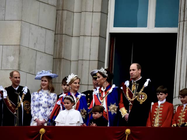 Members of the Royal family on Buckingham Palace balcony including the Prince and Princess of Wales. Image: Simon James Smith