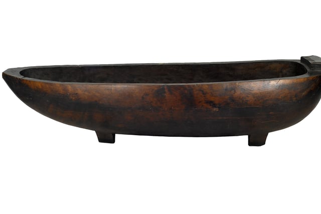 Sometimes mistaken for a dug out canoe, this 3.6 metre long object  is actually a feasting bowl from the Cook Islands. It belonged to Princess Titaua of Tahiti who married a Scotsman, George Darsie. She (and the feast bowl) came with him to Scotland.