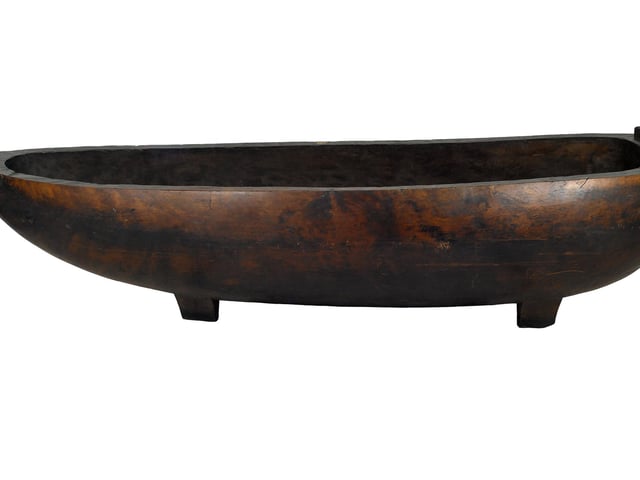 Sometimes mistaken for a dug out canoe, this 3.6 metre long object  is actually a feasting bowl from the Cook Islands. It belonged to Princess Titaua of Tahiti who married a Scotsman, George Darsie. She (and the feast bowl) came with him to Scotland.