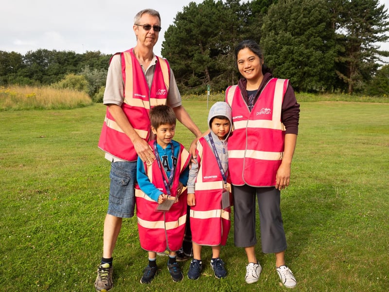 Volunteers Colin, left, Kisig, second left, Dakila and Olivia Gyue, right. Picture: Keith Woodland (140821-6)