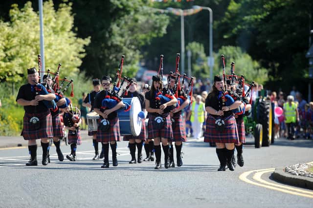 The parade winds its way through Aberdour in 2013
