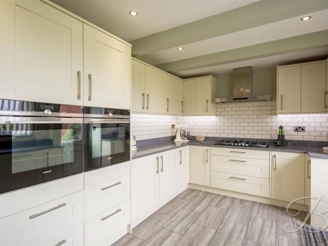 A stunning, modern and stylish fitted kitchen which comes complete with a beautiful range of matching units.