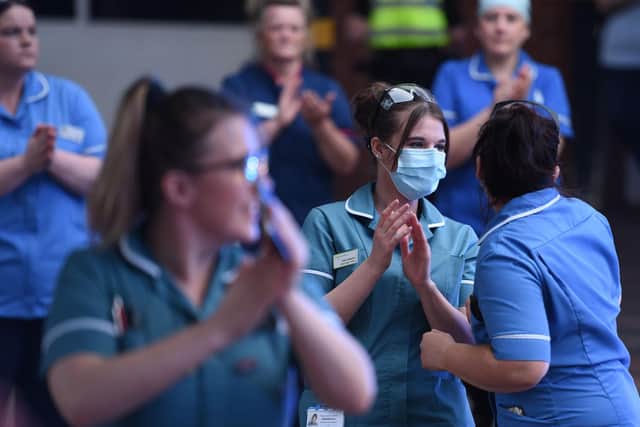 Why 'guilt-tripping' people to clap for the NHS isn't right, says one Star letter writer. (Photo by OLI SCARFF/AFP via Getty Images)