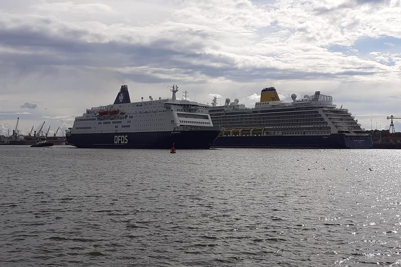 The Spirit of Adventure sits alongside a DFDS ferry on the River Tyne.