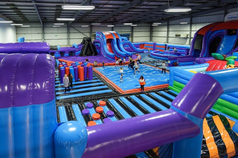 Jump, slide, and bounce at Inflatanation. Specific sessions with reduced participants, lower music volume, and complimentary refreshments ensure a positive experience for all.