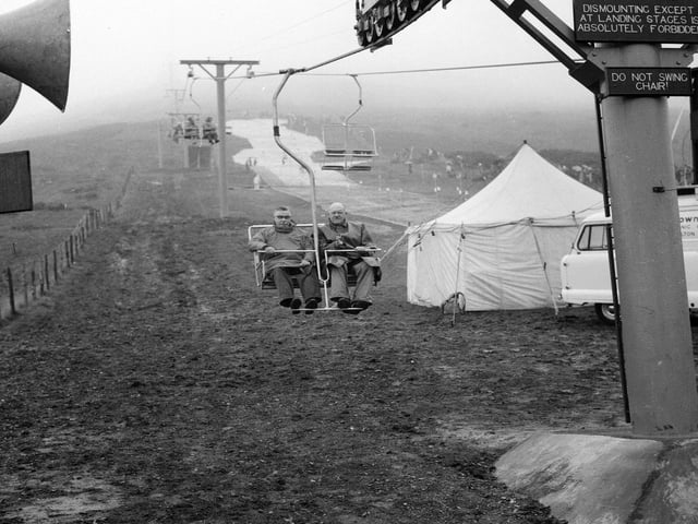 Trying out Hillend's new chair lifts on the first day of opening on September 30, 1966.